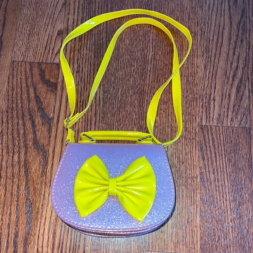 Children’s Pink sparkly handbag with yellow accents and crossbody strap